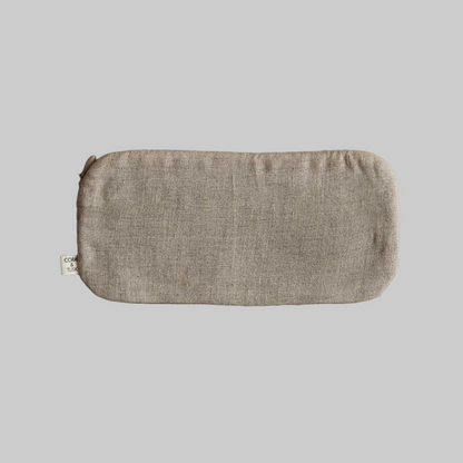 Coral and Tusk's "Glasses" pouch embroidered with a black glasses design and blue eyes