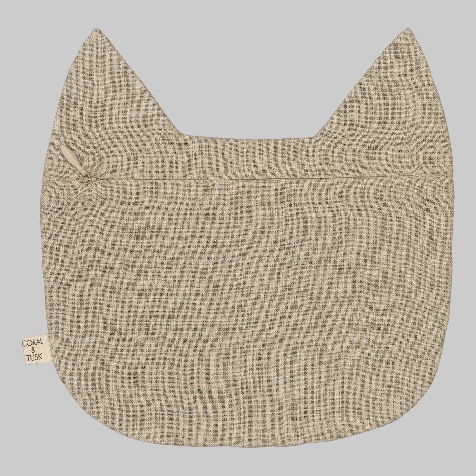 Coral and Tusk’s “Tabby Cat” embroidered linen pouch featuring a gray striped cat with bright green eyes