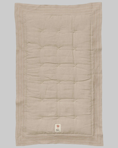 Coral and Tusk's embroidered linen quilt for children or a nursery. Feature alphabet designs with animals playfully representing each letter.