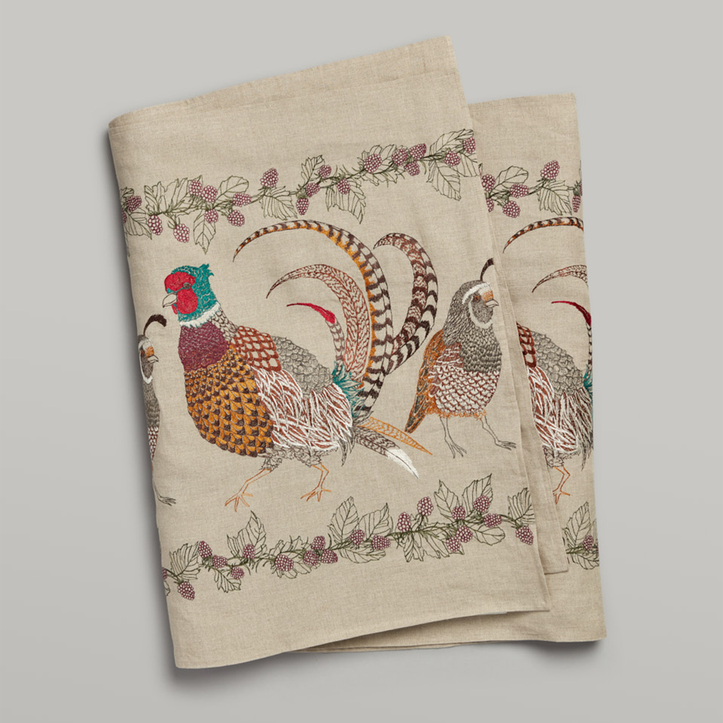 Coral and Tusk's "Pheasant and Quail" embroidered linen table runner 