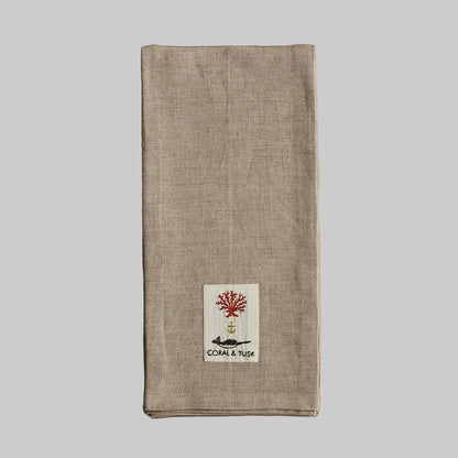 Coral and Tusk’s embroidered linen tea towel
