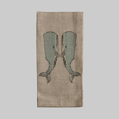 Coral and Tusk’s “Whale Love” embroidered linen tea towel featuring two whales holding fins