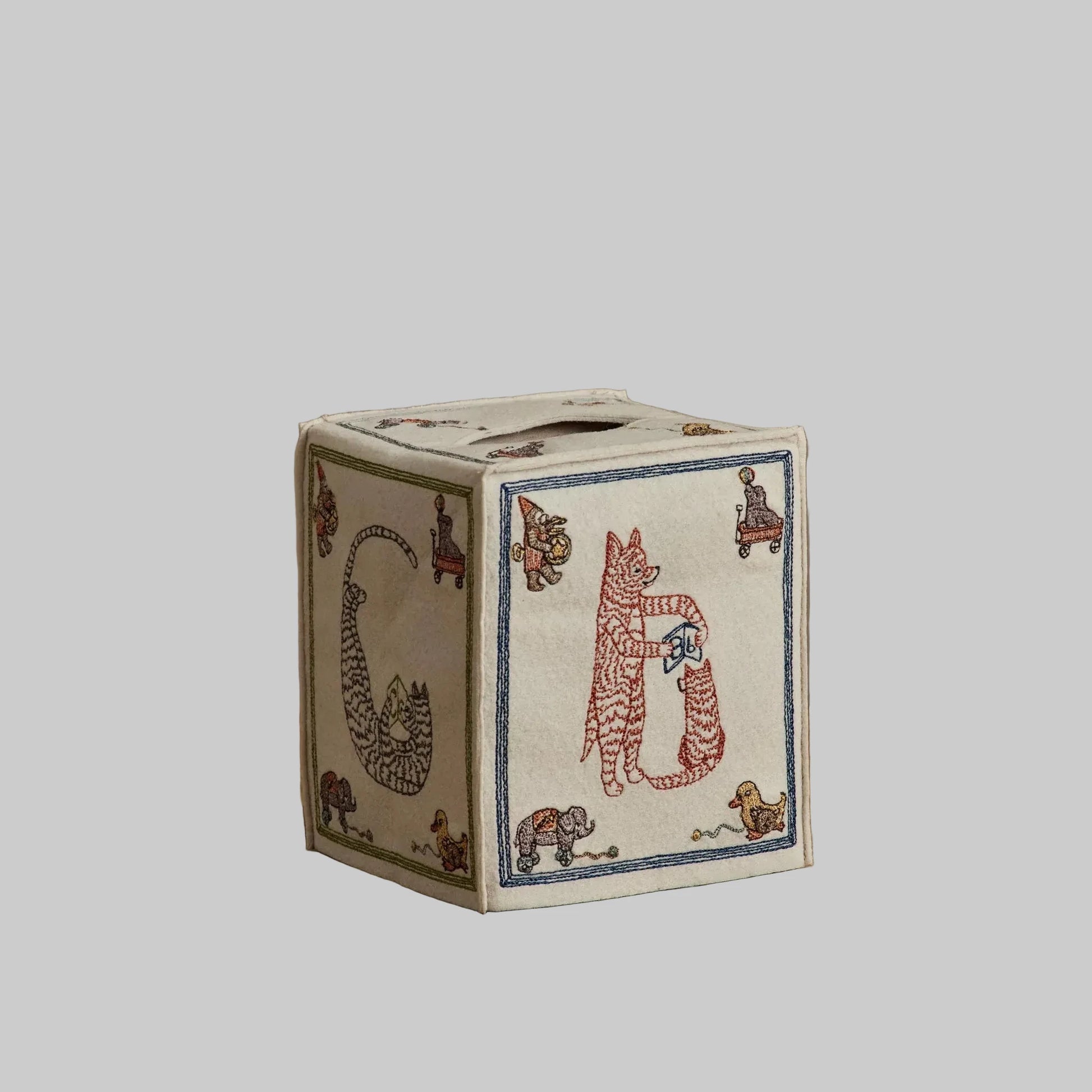 Coral and Tusk’s “ABC” embroidered felt tissue box cover featuring designs inspired by classic children’s building blocks