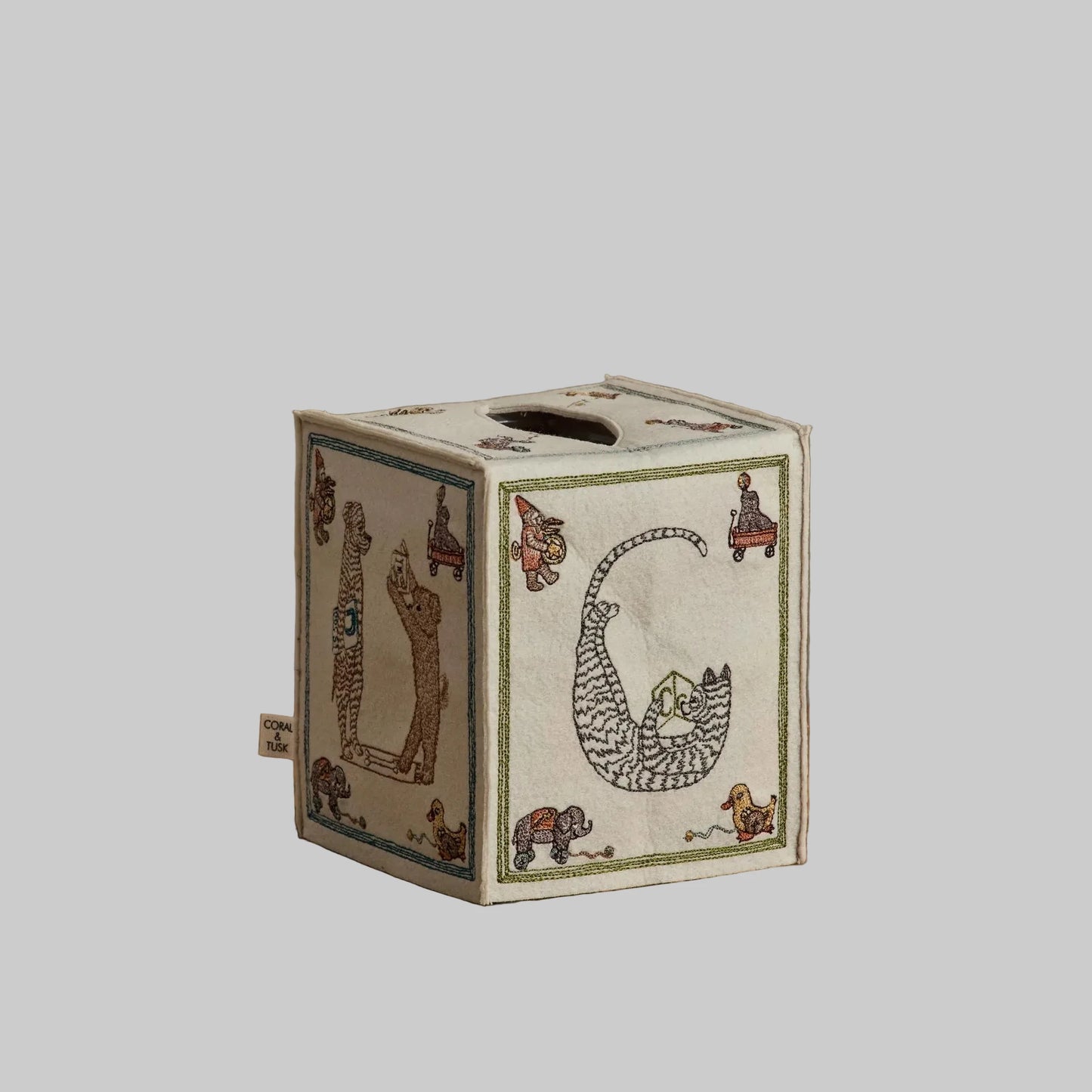 Coral and Tusk’s “ABC” embroidered felt tissue box cover featuring designs inspired by classic children’s building blocks