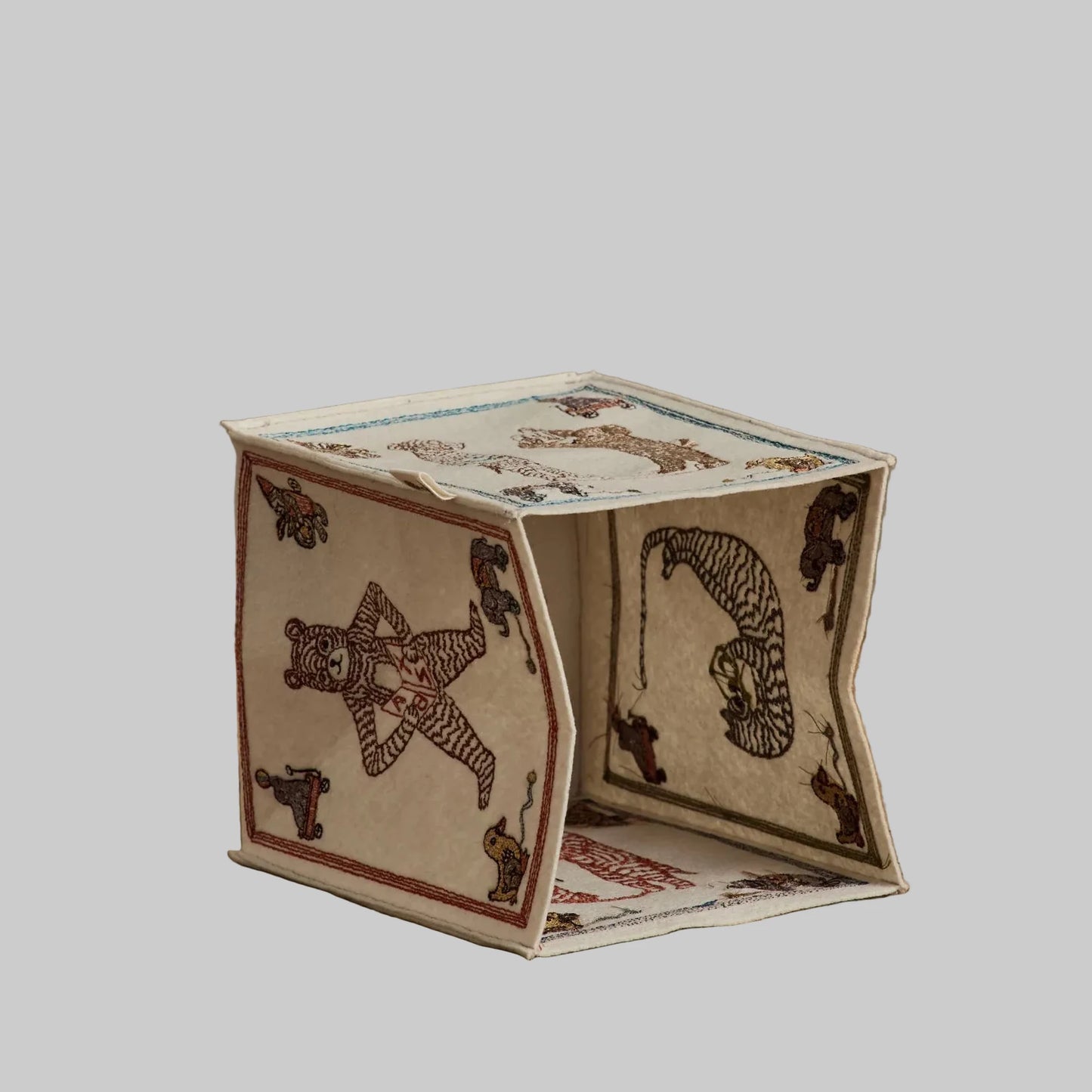 Coral and Tusk’s “ABC” embroidered felt tissue box cover featuring designs inspired by classic children’s building blocks