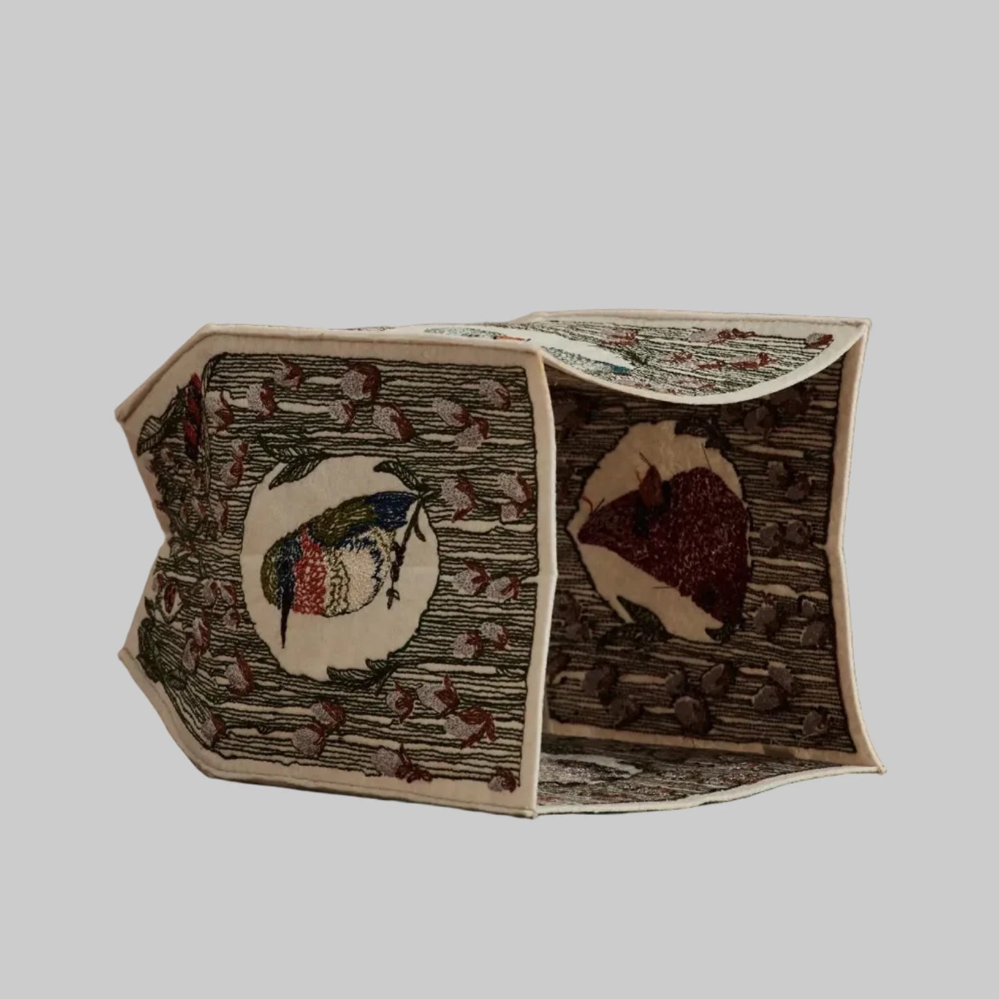 Coral and Tusk's "Birdhouse" tissue box cover made of felt and embroidered with bird and foliage designs
