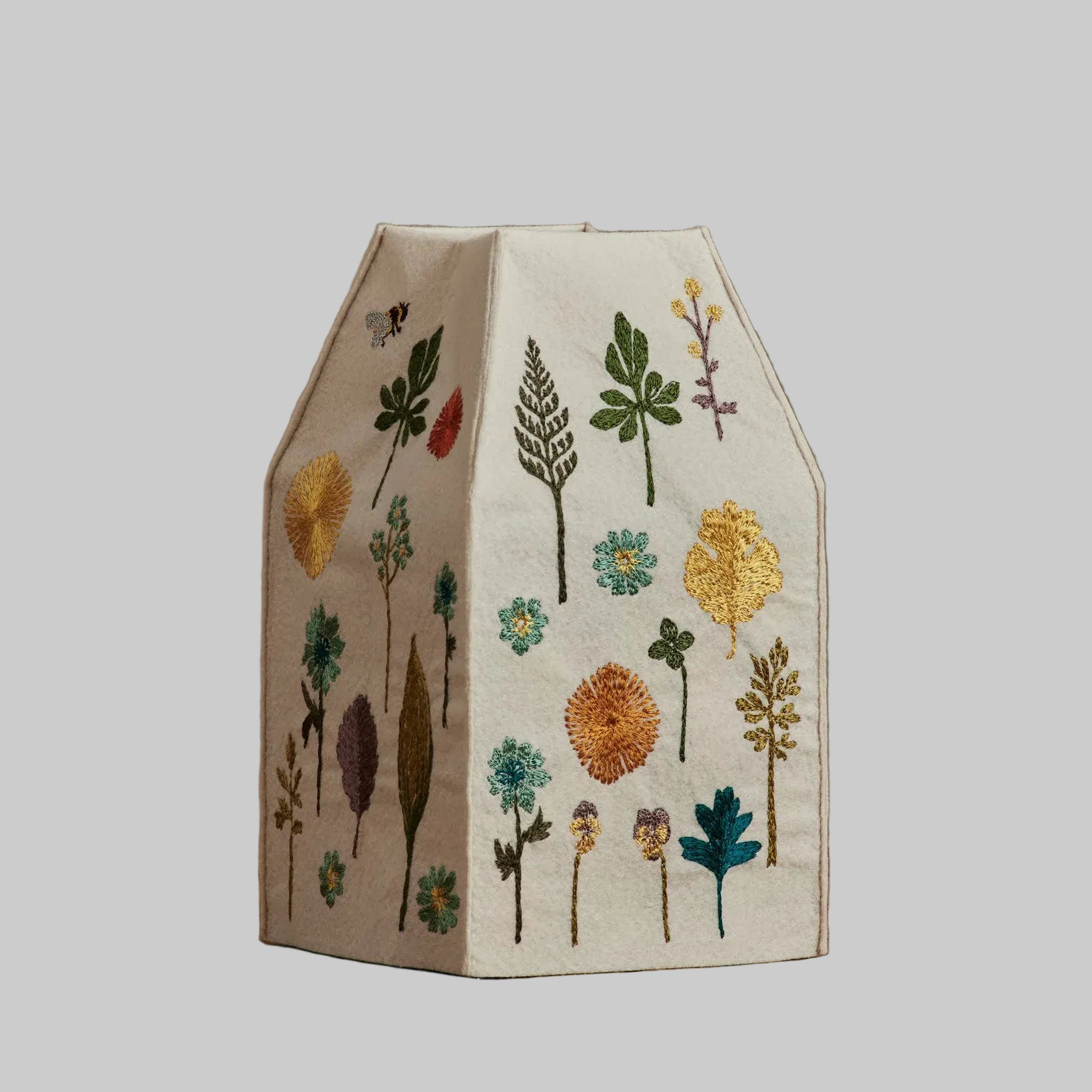 Coral and Tusk's "Garden" tissue box cover made of felt and embroidered with botanical designs
