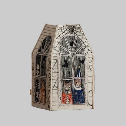 Coral and Tusk's "Haunted House" tissue box cover made of felt and embroidered with Halloween designs