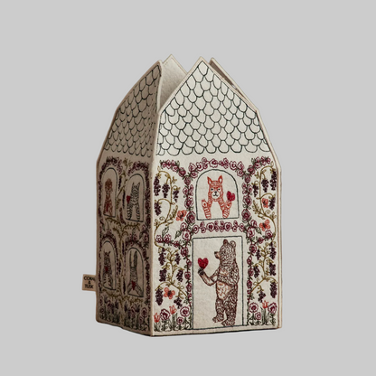 Coral and Tusk's "Home is Where the Heart Is" tissue box cover made of felt and embroidered with a Valentine's design