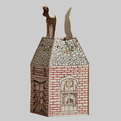 Coral and Tusk's "Home For the Holidays" tissue box cover made of felt and embroidered with festive Christmas designs