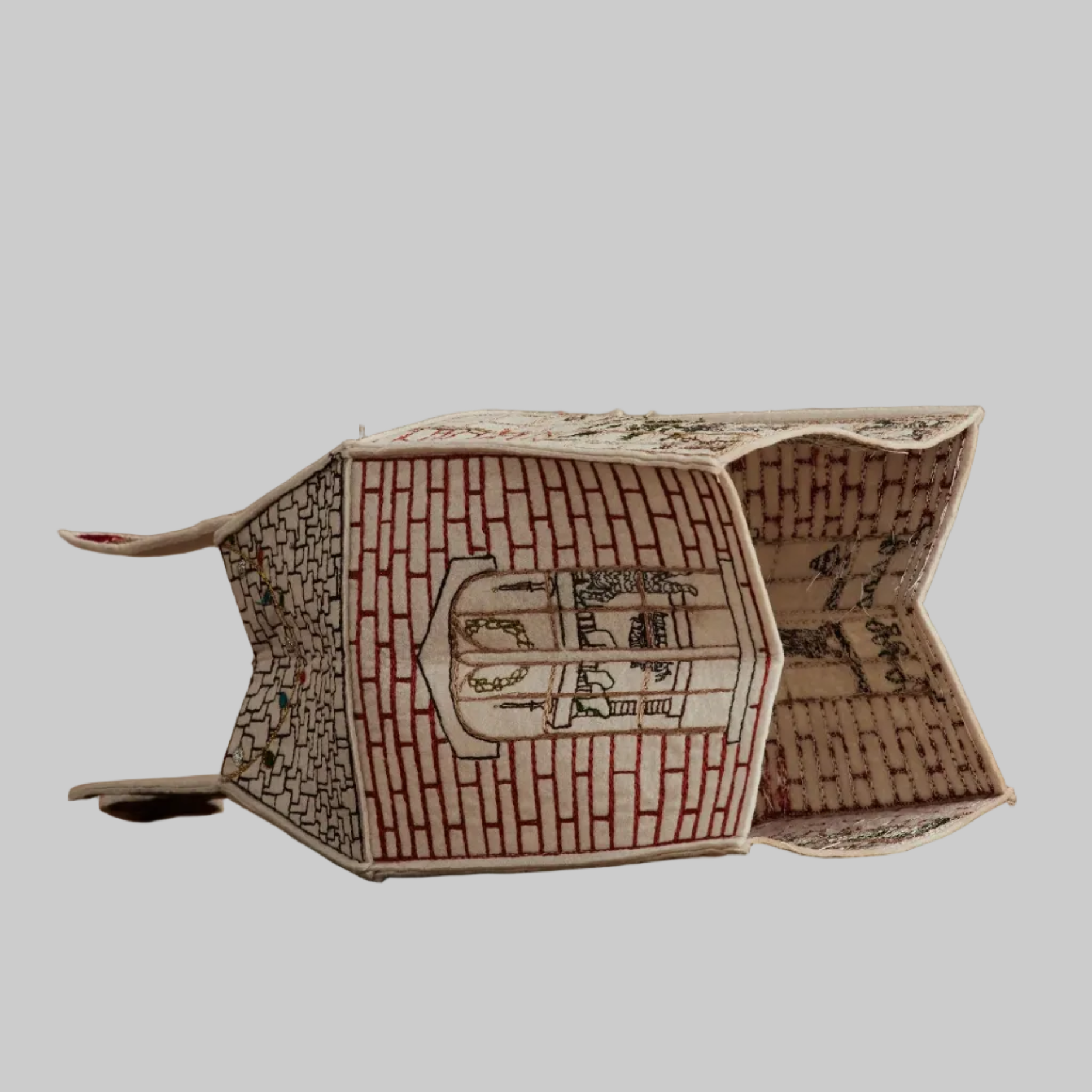 Coral and Tusk's "Home For the Holidays" tissue box cover made of felt and embroidered with festive Christmas designs