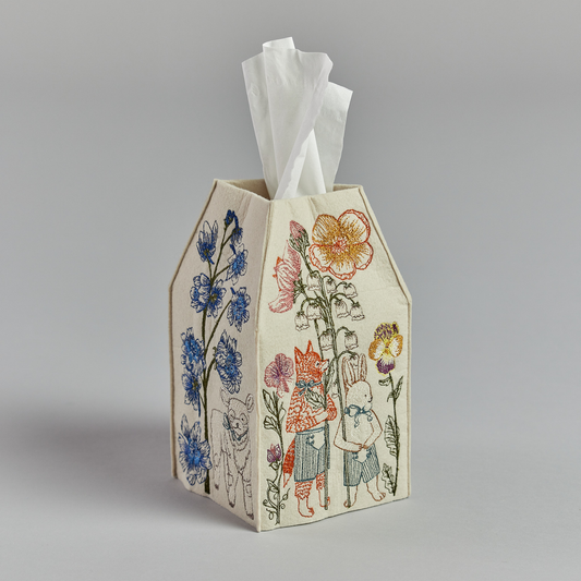 Coral and Tusk's "Spring Parade" tissue box cover made of felt and embroidered with animal and floral designs