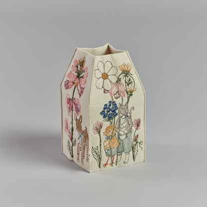 Coral and Tusk's "Spring Parade" tissue box cover made of felt and embroidered with animal and floral designs