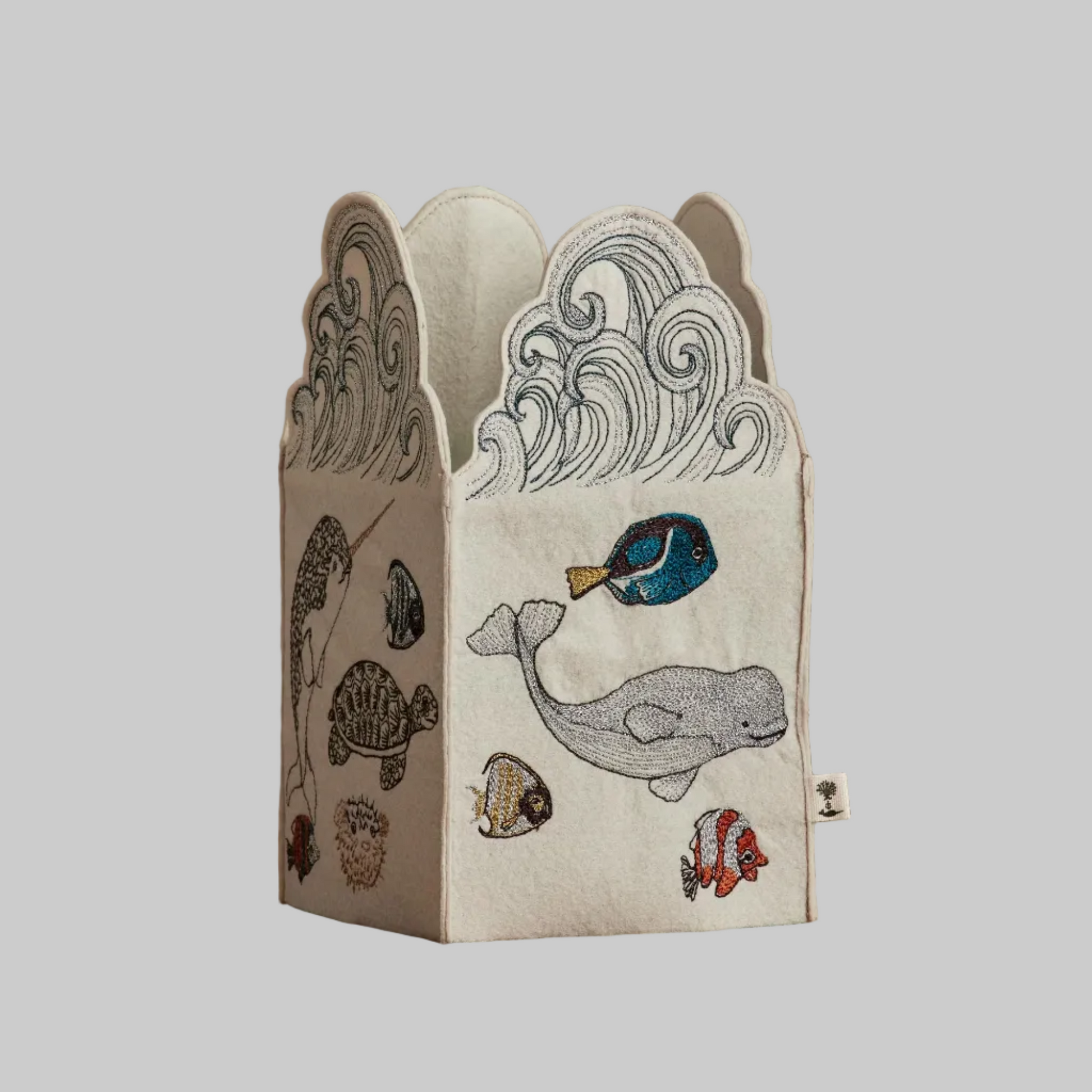 Coral and Tusk's "Swim Team" tissue box cover made of felt and embroidered with ocean animal designs