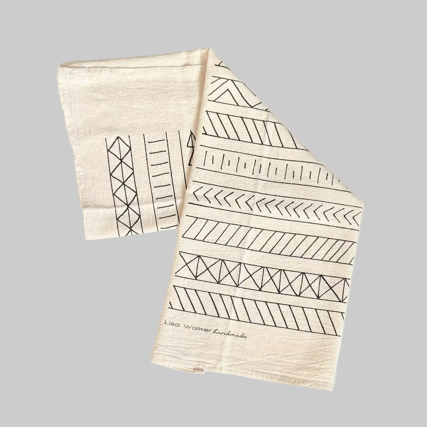 Lisa Walker’s cotton flour sack napkins with screen printed geometric stripe designs, made locally in Jackson Hole, WY