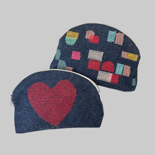 K. Studio’s denim pouches with playful embroidered designs and metal zipper