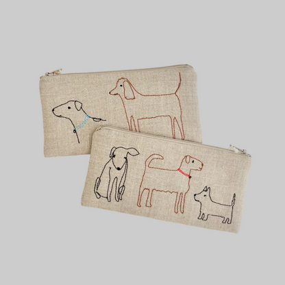 K. Studio’s flax pouches with embroidered dog designs and metal zippers