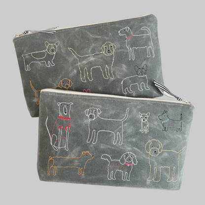 K. Studio’s waxed canvas pouches with embroidered dog breed designs and metal zippers