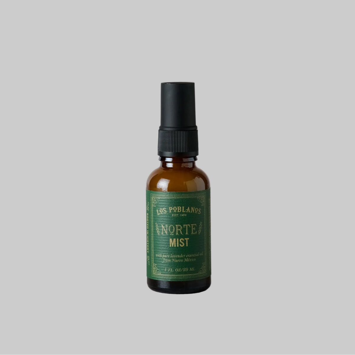 An essential oil room and body spray from Los Poblanos featuring a blend of sage, juniper, cedarwood, organic lavender, and vetiver