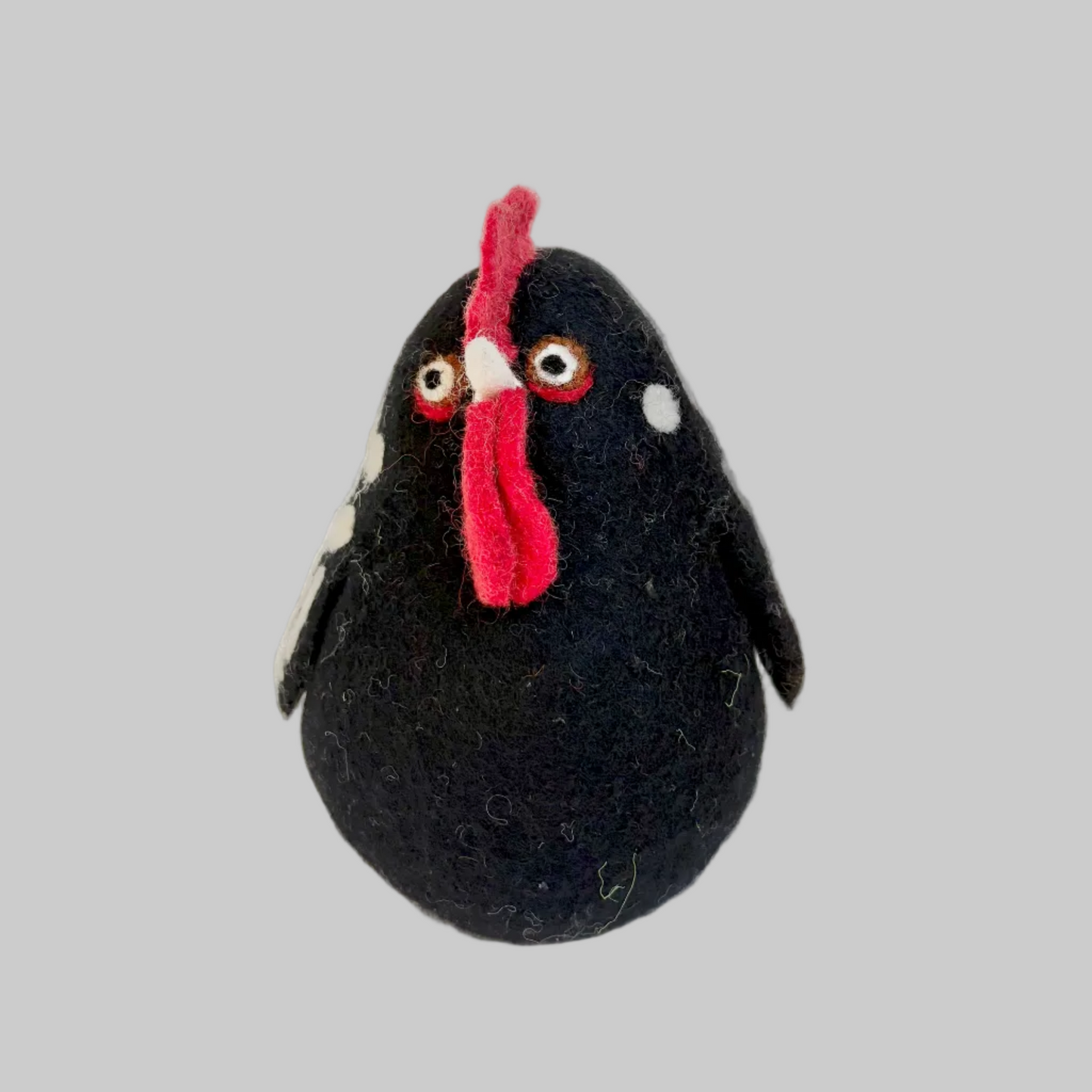The Winding Road’s wool-felted black chicken with white spots, fair trade 