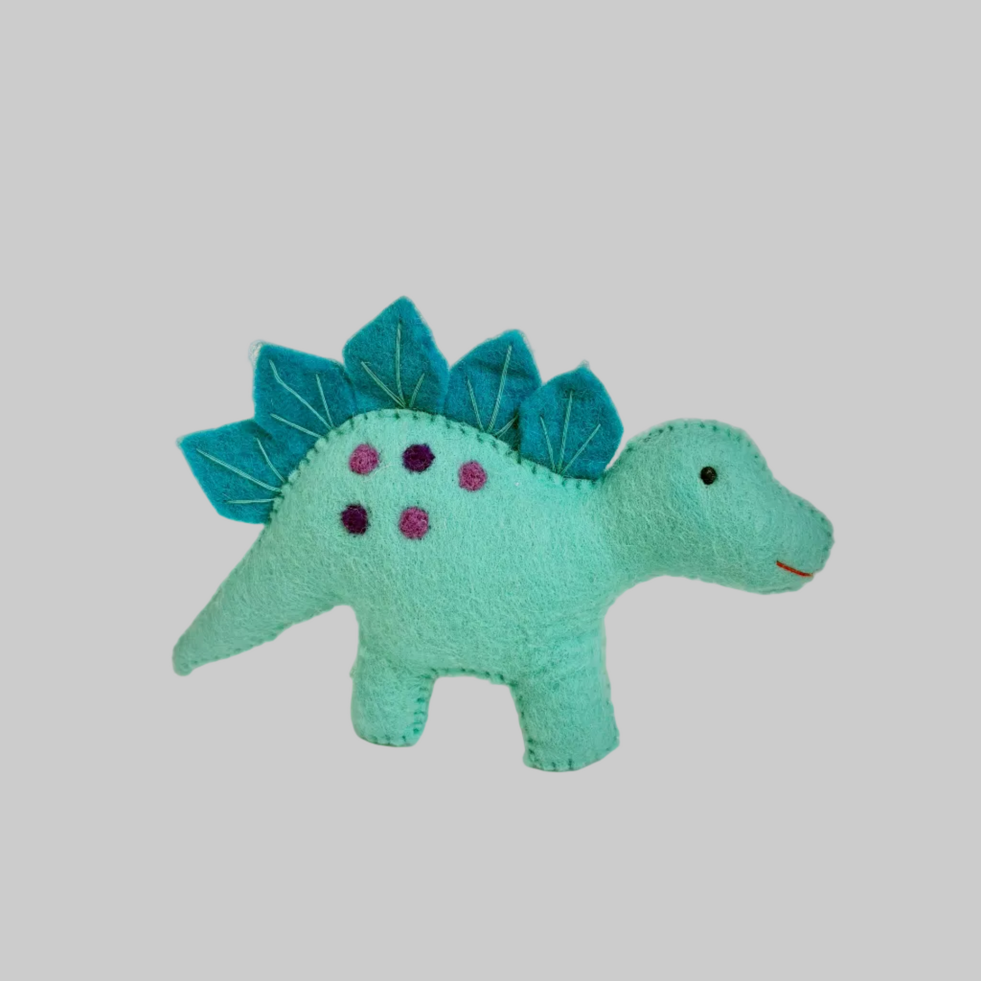 The Winding Road’s wool-felted blue stegosaurus dinosaur, fair trade 