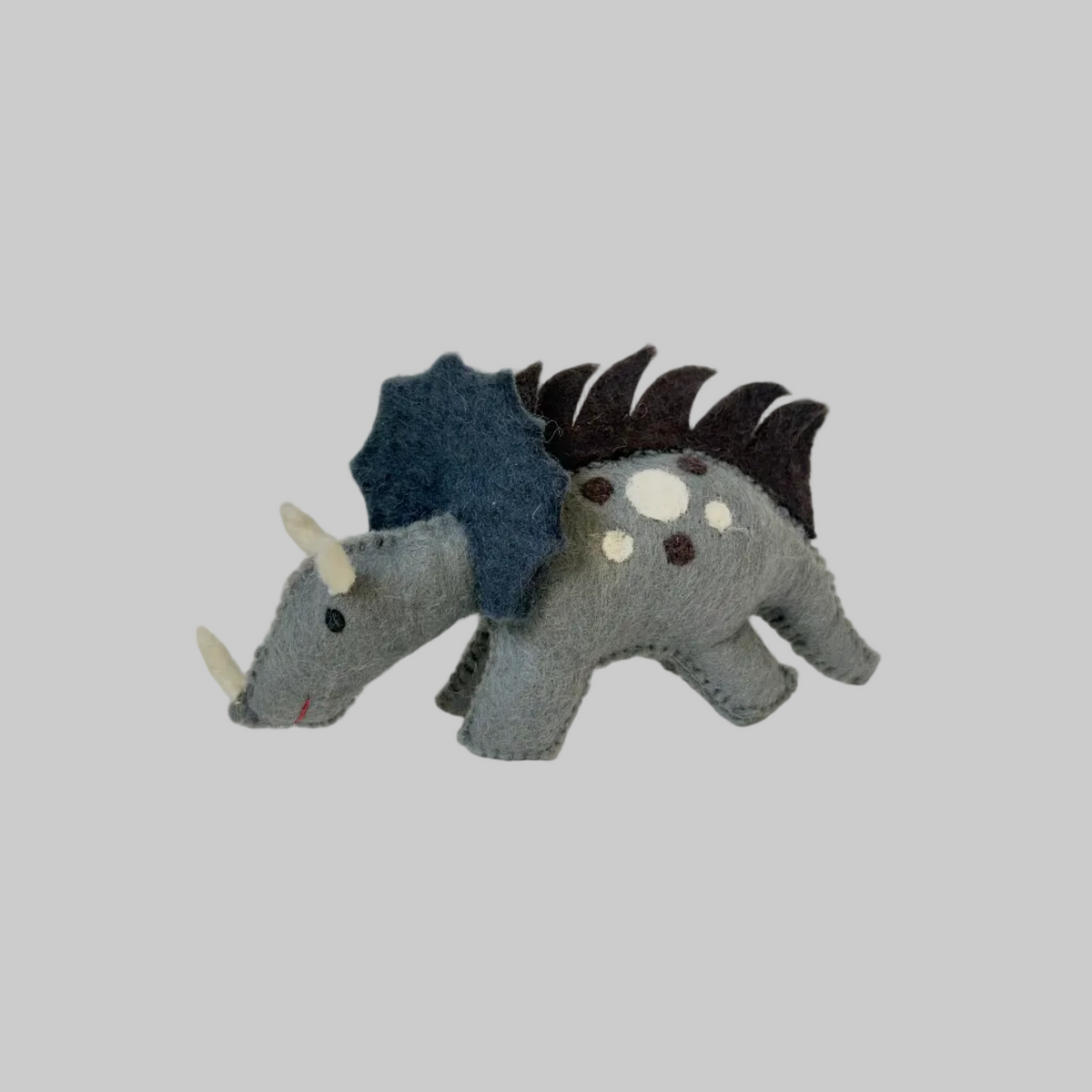 The Winding Road’s wool-felted gray triceratops dinosaur, fair trade 