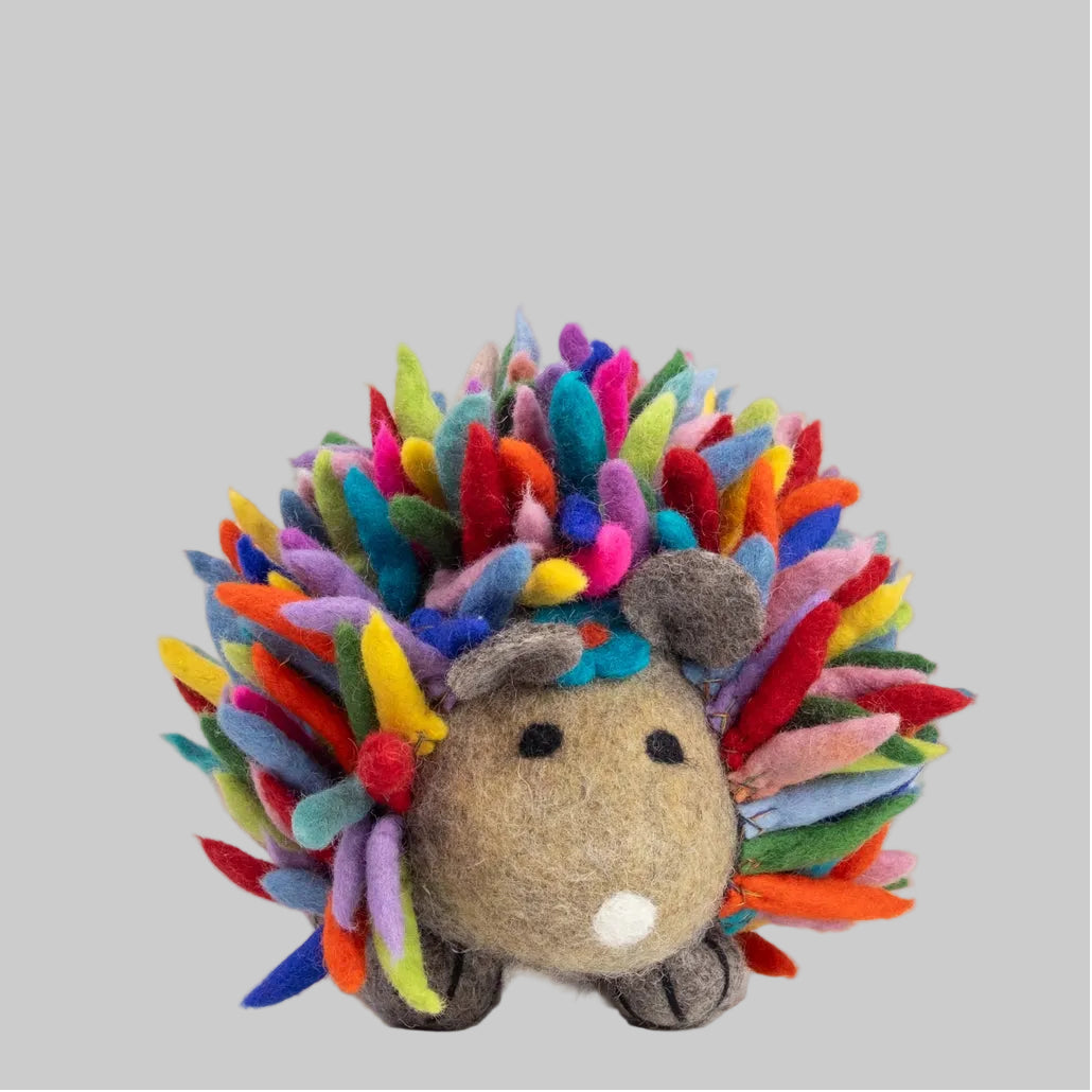 Large felted hedgehog with rainbow quills from The Winding Road. Fair trade and made of 100% wool.