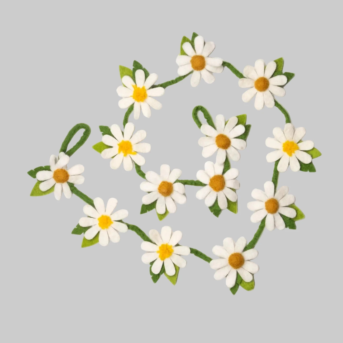 Wool-felted garland from The Winding Road featuring white daisies, use for house decor or kids room