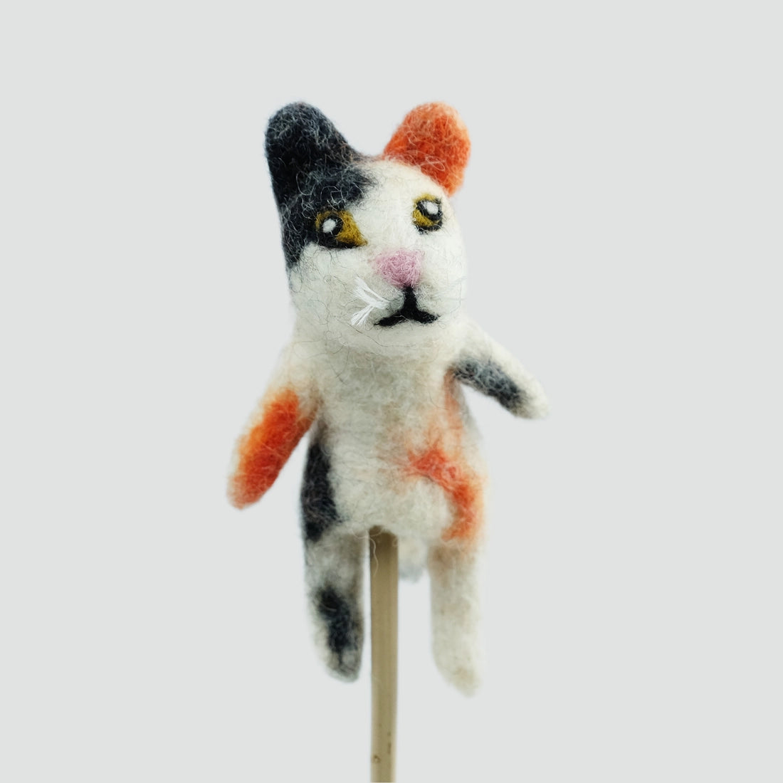 The Winding Road’s wool-felted calico cat finger puppet