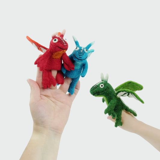 The Winding Road’s wool-felted finger puppet dragons in blue, green, and red
