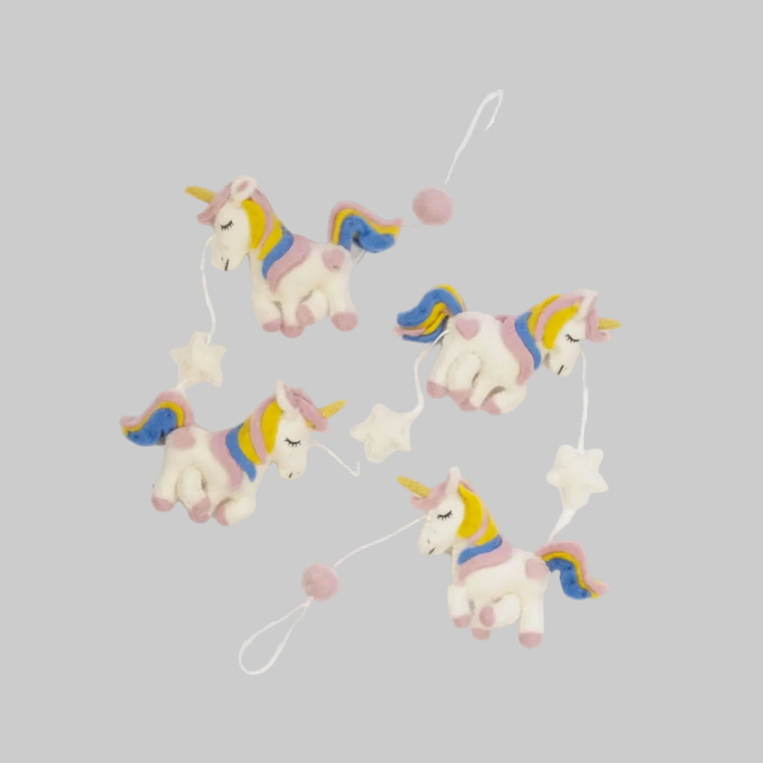 Wool-felted garland from The Winding Road featuring pastel unicorns, use for house decor or kids room