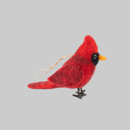 The Winding Road's wool-felted ornaments featuring red cardinal design. Handmade and fair trade.