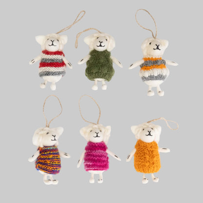 The Winding Road's wool-felted ornaments featuring white sheep wearing colorful sweaters. Handmade and fair trade.
