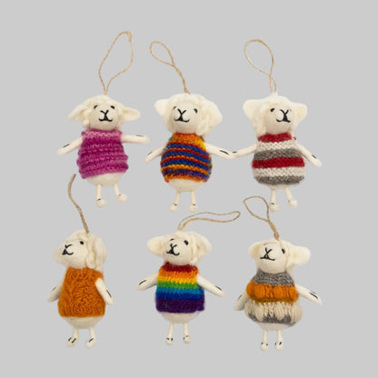 The Winding Road's wool-felted ornaments featuring white sheep wearing colorful sweaters. Handmade and fair trade.