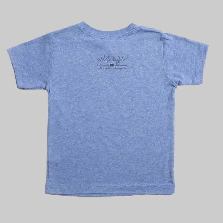 Bird and Buffalo’s kid’s t-shirt in blue with a logo on the back, locally made in Jackson Hole, WY