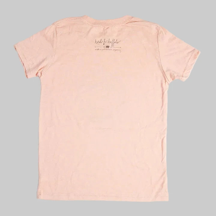 Bird and Buffalo’s kid’s t-shirt in pink with a logo on the back, locally made in Jackson Hole, WY