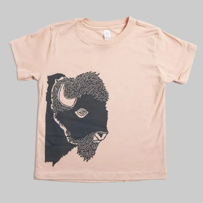 Bird and Buffalo’s kid’s t-shirt in pink with a bison profile design, locally made in Jackson Hole, WY