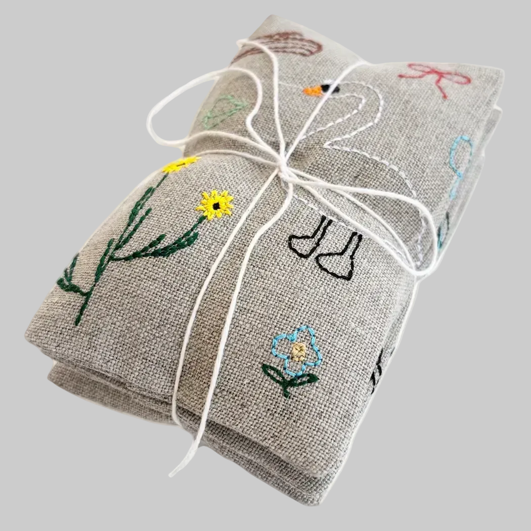 K. Studio’s lavender sachets embroidered with organic designs of birds, flowers, and plants