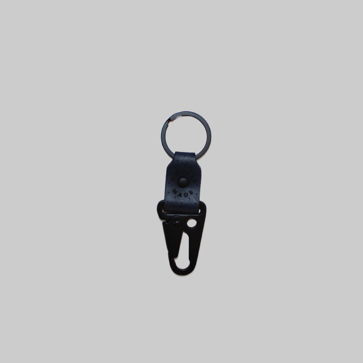 Woolly Made's leather clip keychain in navy.