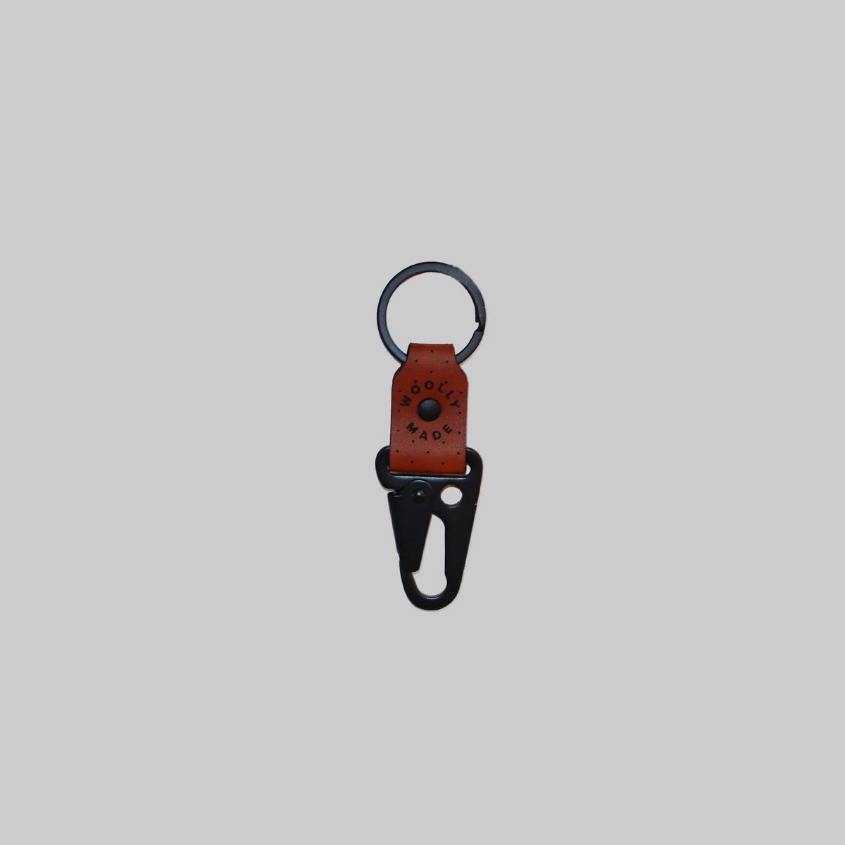 Woolly Made's leather clip keychain in brown.