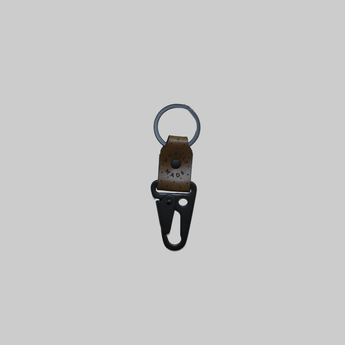 Woolly Made's leather clip keychains in olive green.