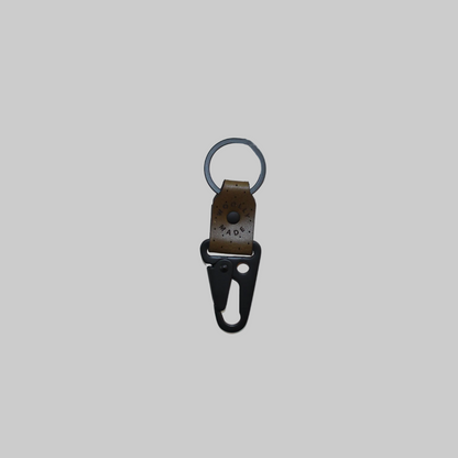 Woolly Made's leather clip keychains in olive green.