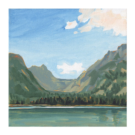 A.T. Patterson’s art print titled “Lake Views” featuring a turquoise lake settled in a mountain valley 