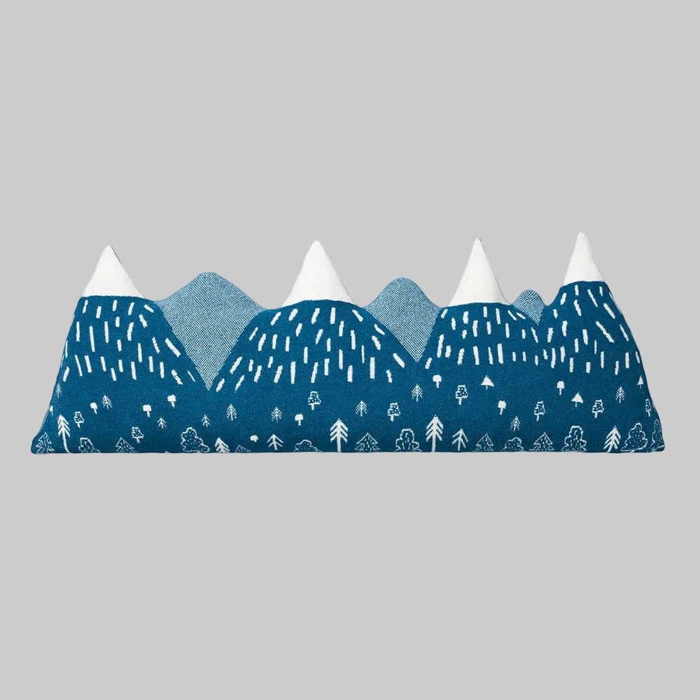 Donna Wilson's "Mountain Peak" bolster pillow for bed headboard