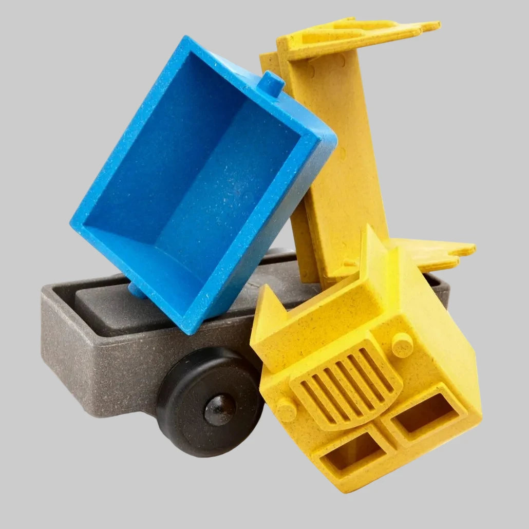 Puzzle tipper truck made up of stackable and interchangeable parts made by Luke’s Toy Factory, recycled materials, made in the USA