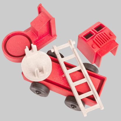 Puzzle fire truck made up of stackable and interchangeable parts made by Luke’s Toy Factory, recycled materials, made in the USA