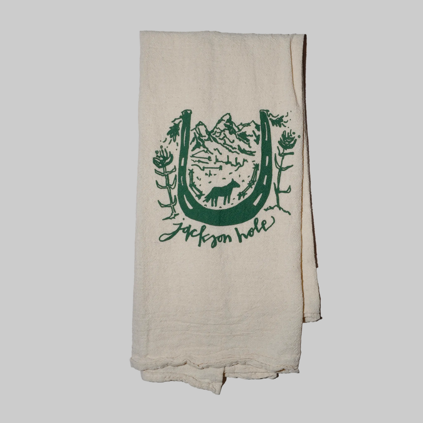 Bird and Buffalo’s cotton flour sack tea towels with screen printed horseshoe and mountain scenery design, made locally in Jackson Hole, WY