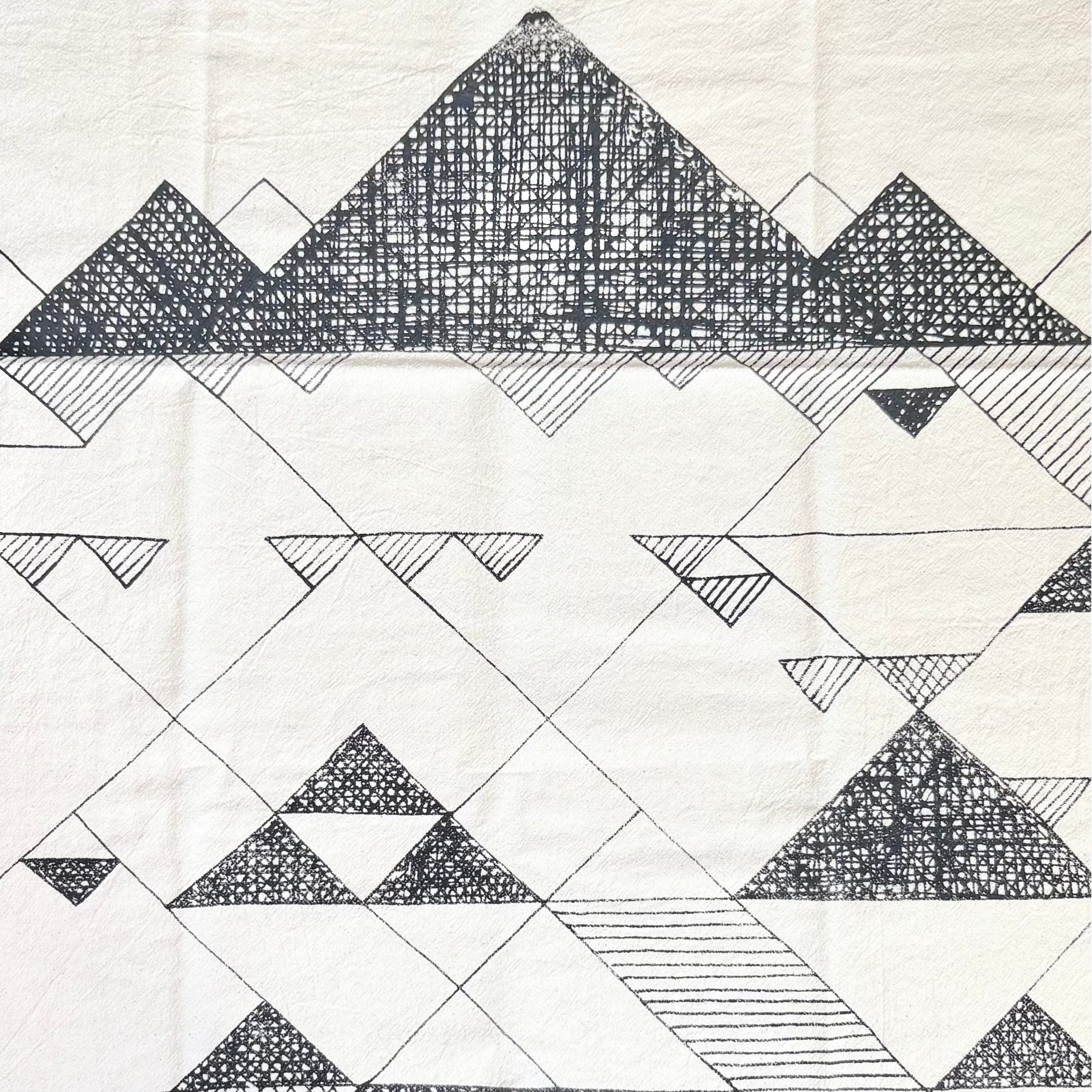 Lisa Walker’s cotton flour sack tea towel with screen printed geometric mountain designs, made locally in Jackson Hole, WY
