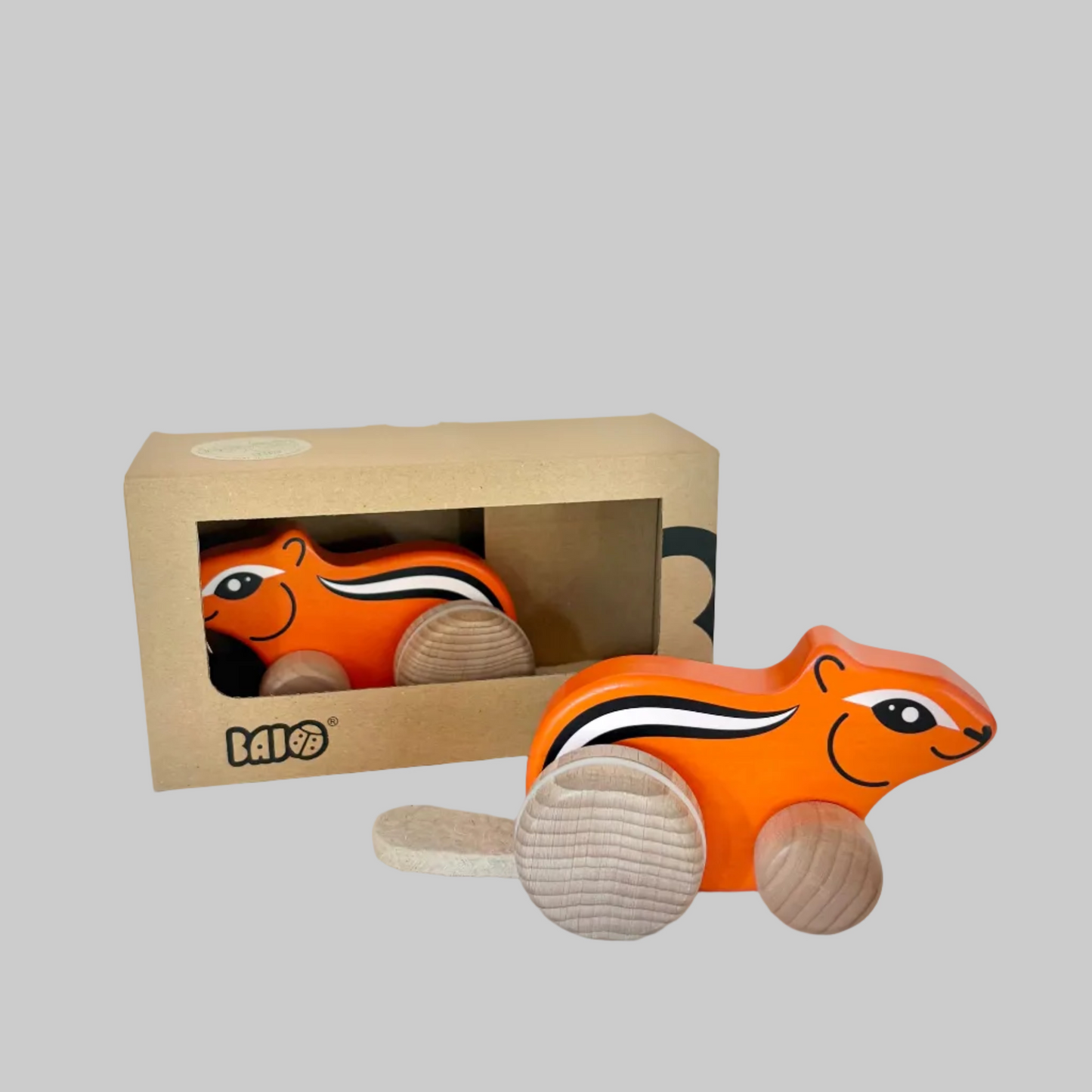 Little Poland Gallery’s wooden toys featuring an orange chipmunk with a felt tail and bouncy wheels