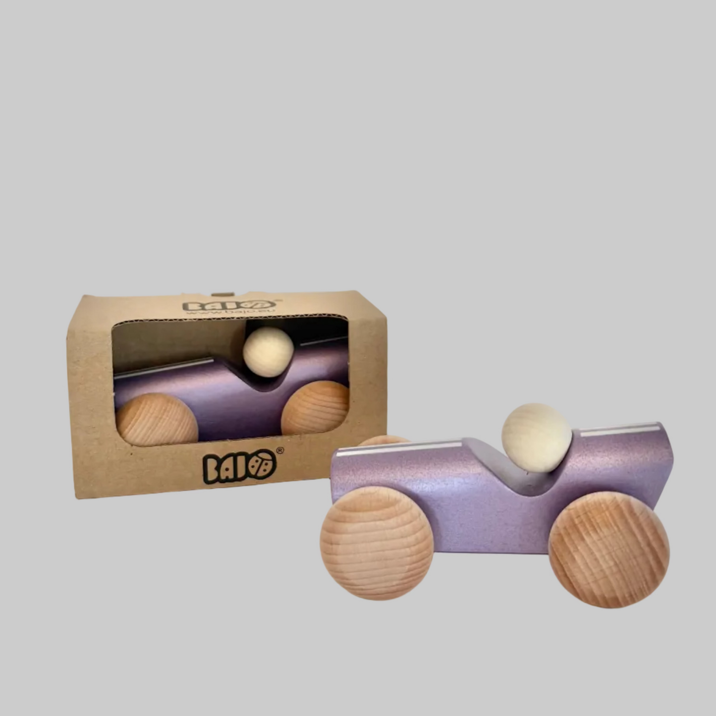 Little Poland Gallery’s wooden toys featuring a purple vintage racing car with shimmering paint and white stripes